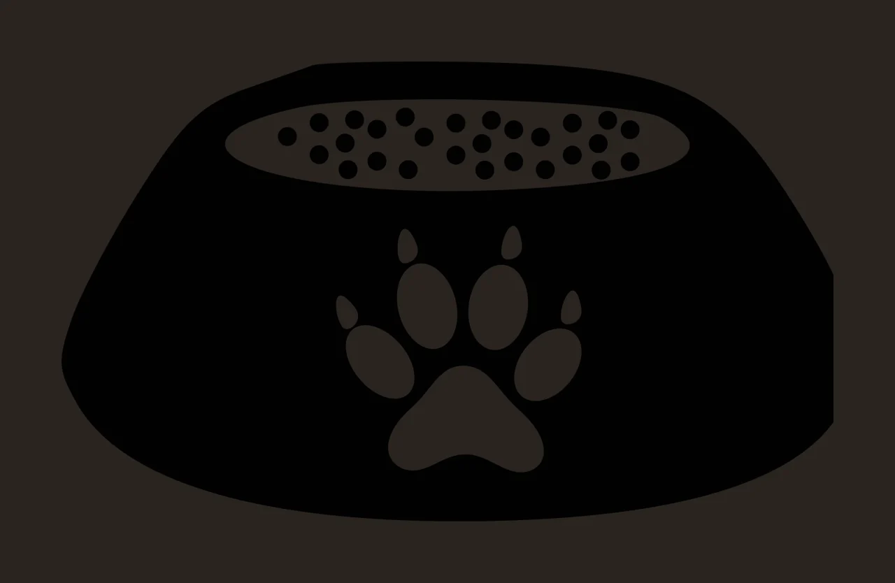 Pet food bowl with paw print design with black bowl, white paw print, white oval kibble area and black dots representing kibble contrast preview thumbnail